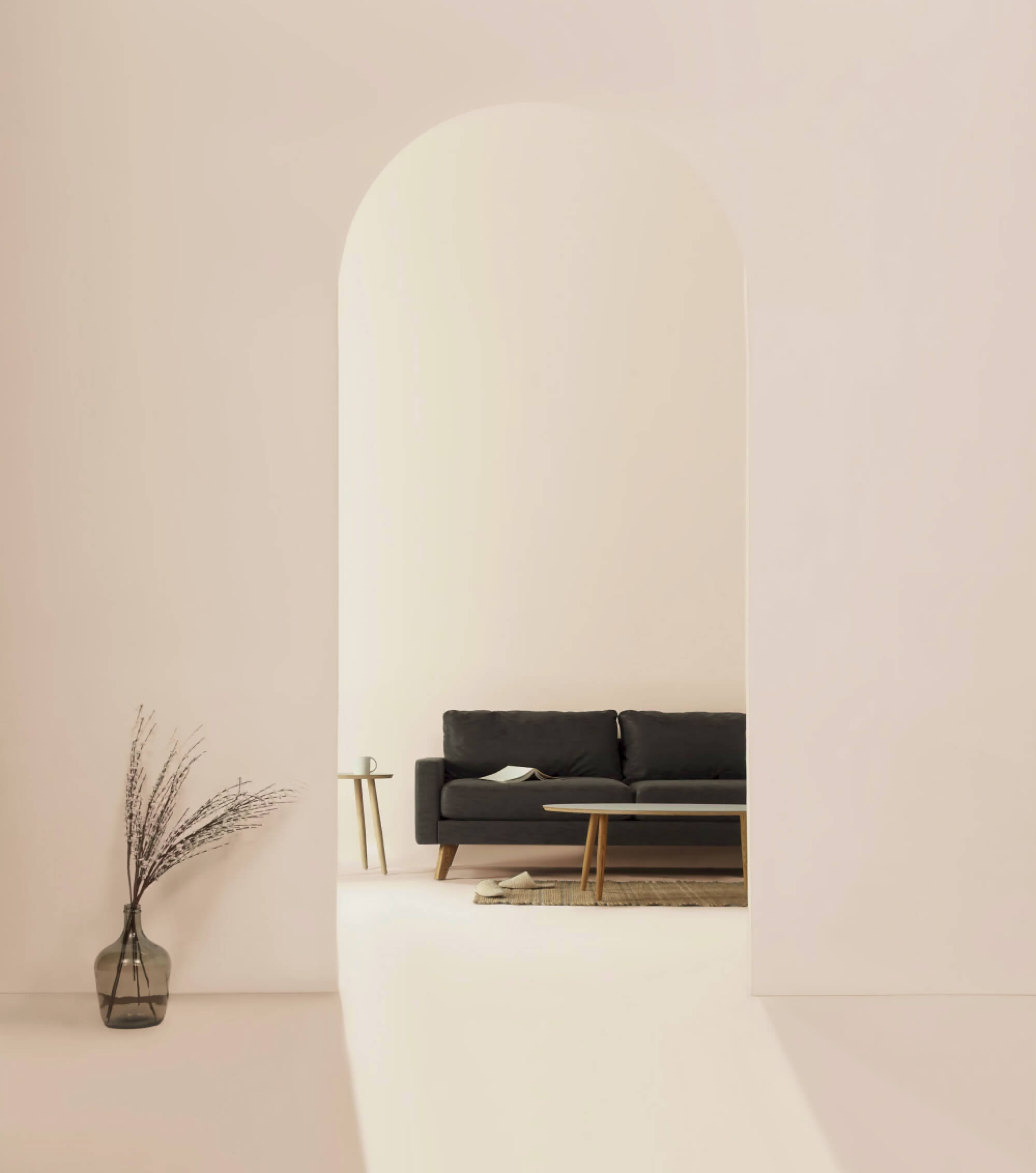 A black sofa in a white room